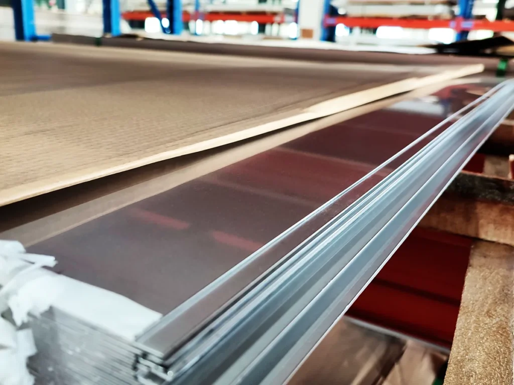 Stack of 304 stainless steel sheets ready for cutting