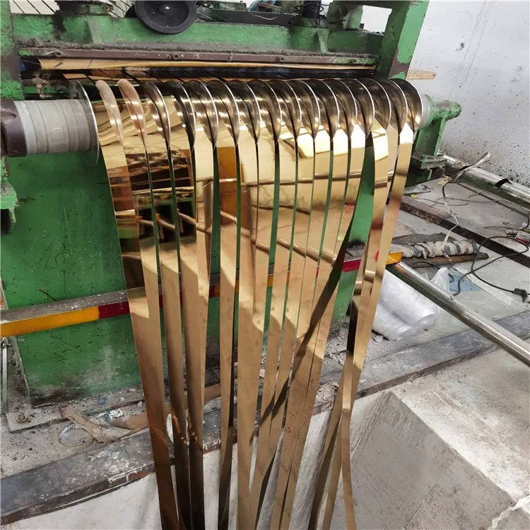Mirror polished stainless steel strips on a slitting line