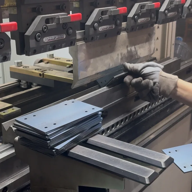 Bending a steel part on a CNC press brake