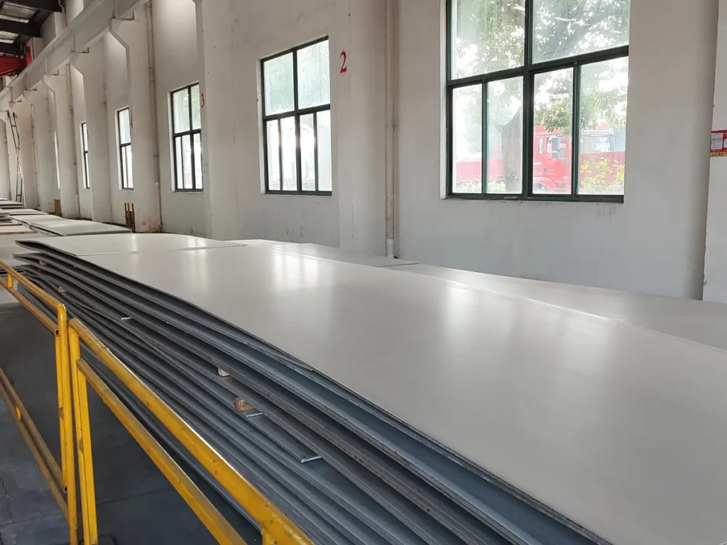Heavy stainless steel plates in the warehouse